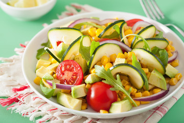 spiralized courgette salad with sweetcorn tomato avocado, healthy vegan meal