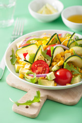 spiralized courgette salad with sweetcorn tomato avocado, healthy vegan meal