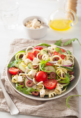 spiralized courgette salad greek style with tomato feta olives cucumber