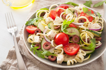 spiralized courgette salad greek style with tomato feta olives cucumber