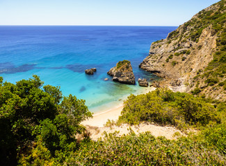 Hiking path on the way down to Praia da Ribeira do Cavalo, beautiful remote beach in Sesimbra, Portugal