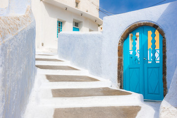 Narrow neighborhood at the old traditional village of Pyrgos, Santorini, Greece.