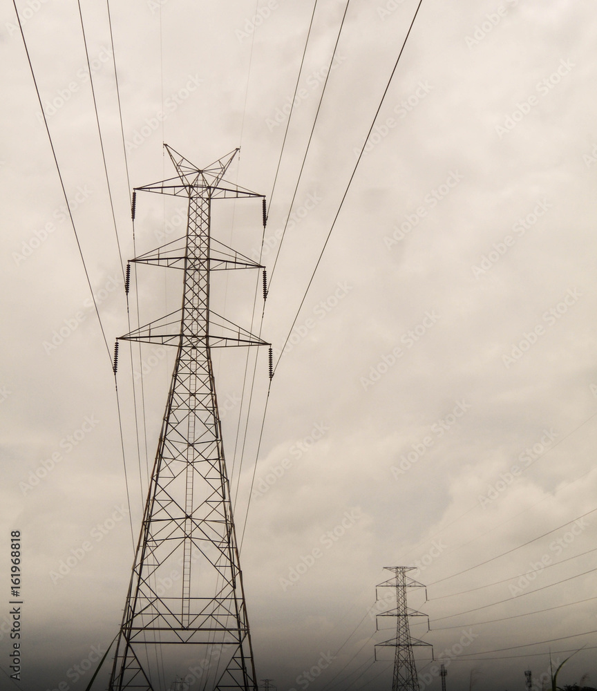 Wall mural high voltage pole sky background.