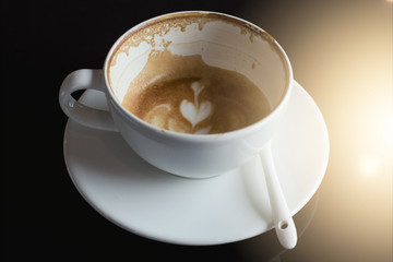 Empty coffee cup with black background