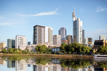 Morning view on the financial district with Main river in Frankfurt city, Germany