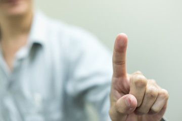 Business man with pointing to something or touching imaginary screen