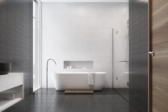 White bathroom, black tiles, sink