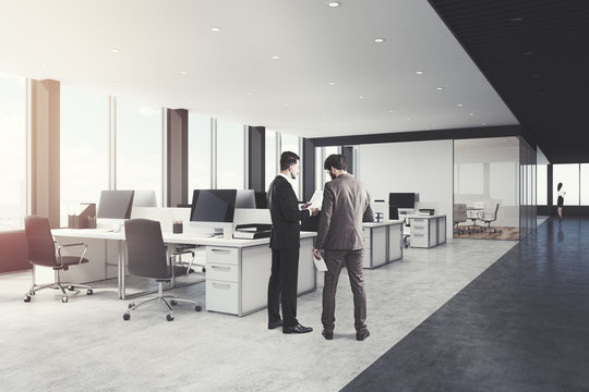 White and black open space office side, men