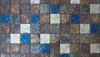 Beautiful multi-colored vintage sidewalk tile with a texture under the Middle Ages