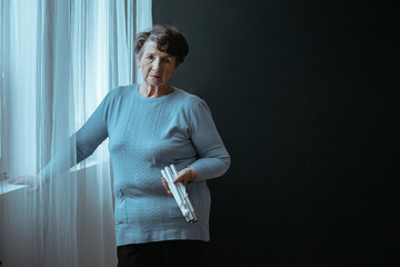 Blind senior holding a stick