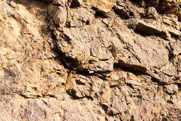 Stone cliffs in the mountains as a background