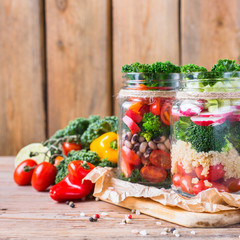 Healthy vegan salad in a mason jar with quinoa