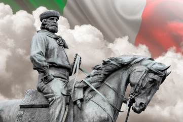Giuseppe Garibaldi, the Hero of Two Worlds equestrian statue with italian flag on background