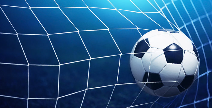 Fototapeta Soccer ball in goal