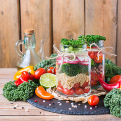 Healthy vegan salad in a mason jar with quinoa