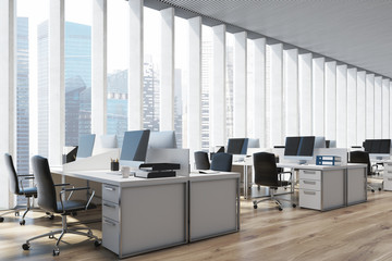 Workplace in an open space office, side closeup