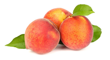 Peach. Fruit with green leaf isolated on white background