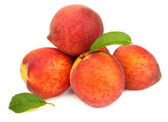 Peach. Fruit with green leaf isolated on white background