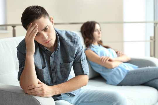 Sad young man after quarrel with girlfriend