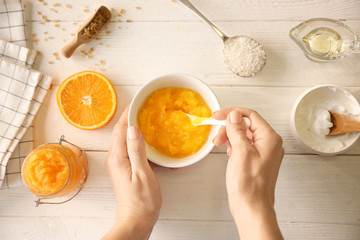 Woman preparing natural body scrub