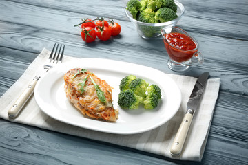 Delicious chicken parmesan meal with broccoli on plate