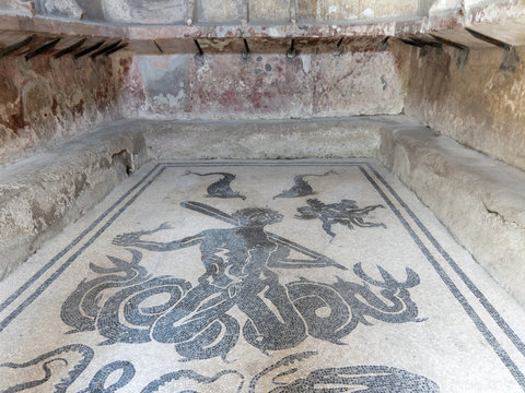 Roman baths in Herculaneum, Naples, Italy, with mosaics