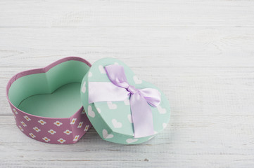 Pastel green gift box and pink bow