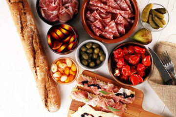 spanish tapas and sangria on wooden table - mediterran antipasti set