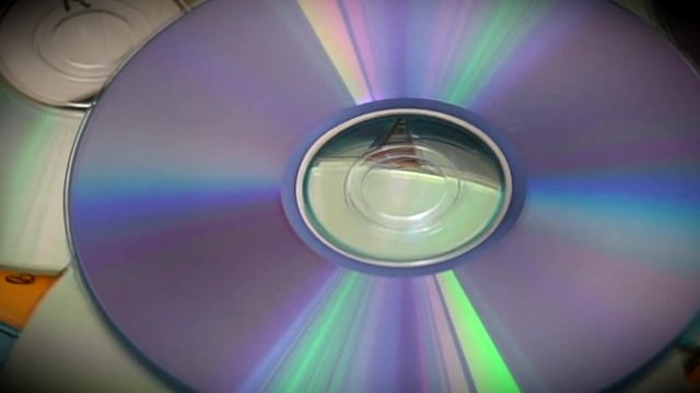 Closeup Compact Optical cd or Dvds Disks Rotating