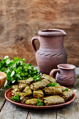 Dolma(tolma, sarma) - stuffed grape leaves with rice and meat. Traditional Caucasian, Ottoman, Turkish and Greek cuisine