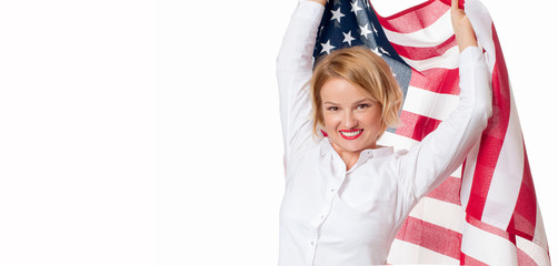 Smiling patriotic woman holding United States flag. USA celebrate 4th July.