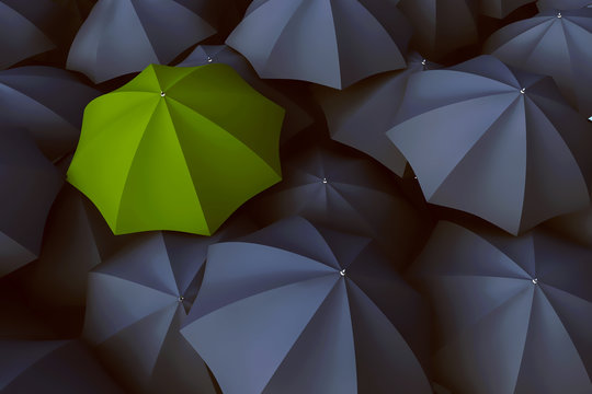 Gr&uuml;ner Regenschirm zwischen vielen grauen Regenschirmen