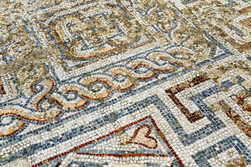 Heart detail of ancient mosaic on the street of Roman Archaeological site of Ephesus in Turkey.