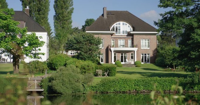 View of beautiful urban villa located near river