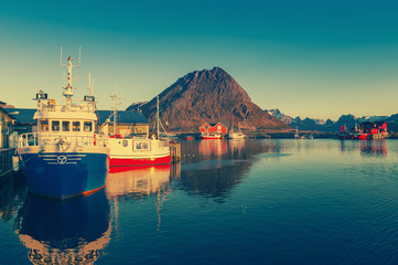 shing boats in harbor at midnight sun in Northern Norway, Lofoten Island, Ramberg, Norway