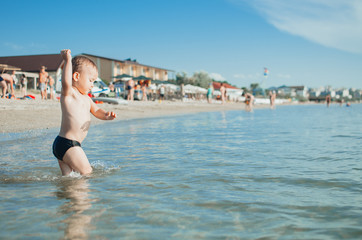 Little boy swimming in sea