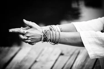 Fotobehang woman hands in yoga symbolic gesture mudra bw © Coka