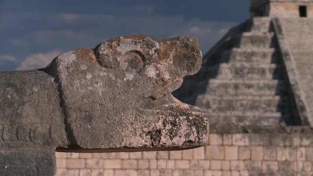 Ancient Mayan snake eats pyramid. Dolly shot of ruins Maya pyramids