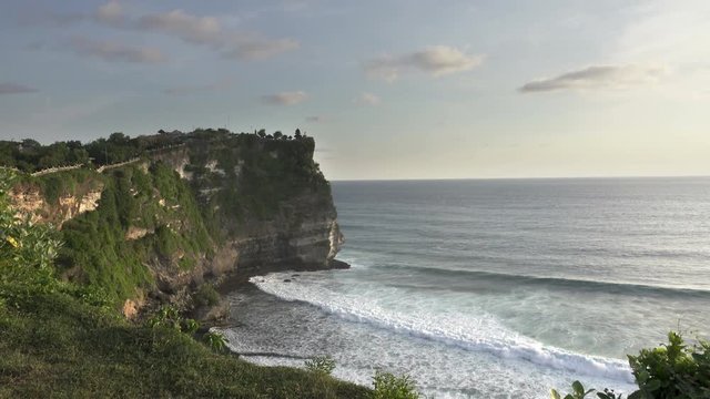 Pura Luhur Uluwatu. Bali Indonesia, the Panoramic view in time sunset