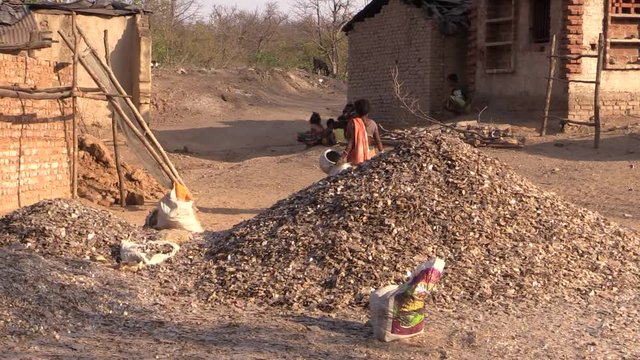 Mica in Indian village. Mountain of mica