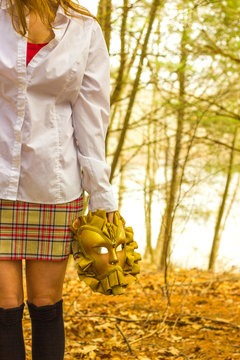 Girl in Red Shirt and Plaid Skirt with Gold Mask 2