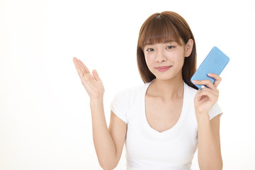 スマートフォンを持つ女性