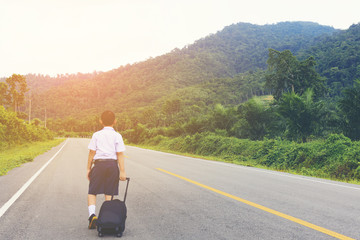 Asian student,Behind of Asian student with bag and nature view