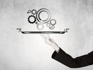 Working cog wheel concept on tray