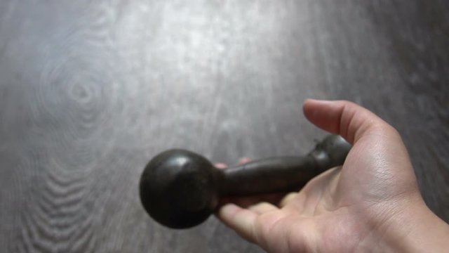 Kettlebell Falling From the Hand Failure Concept
