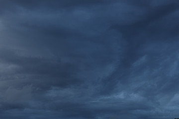 Obraz premium dramatic moody dark storm cloud sky used image for a bad day background