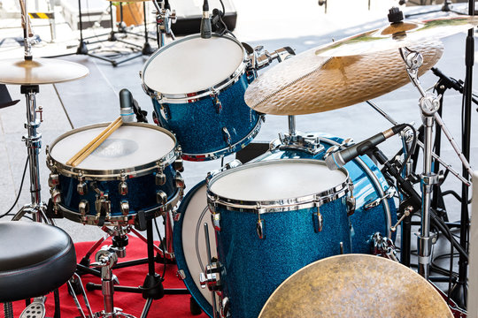 detailed view of drum kit setup standing on concert outdoor stage