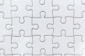 Fototapeta premium White jigsaw puzzle