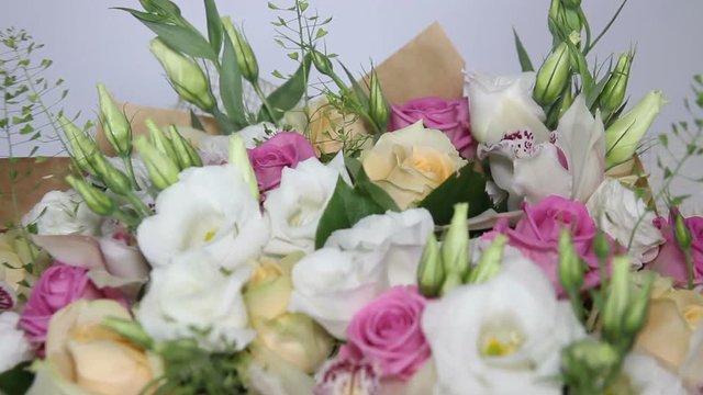 Pink roses and eustoma bouquet with bow