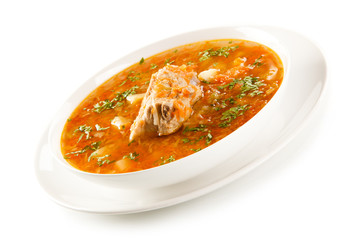 Vegetable soup with pork on white background